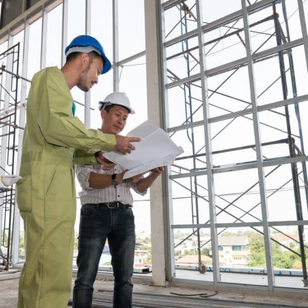 Men planning building work