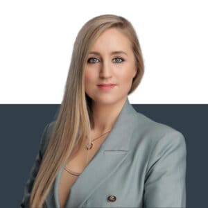 Professional female insurance broker in business attire promoting Jensten Insurance Brokers services.