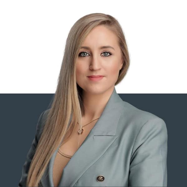 Professional female insurance broker in business attire promoting Jensten Insurance Brokers services.