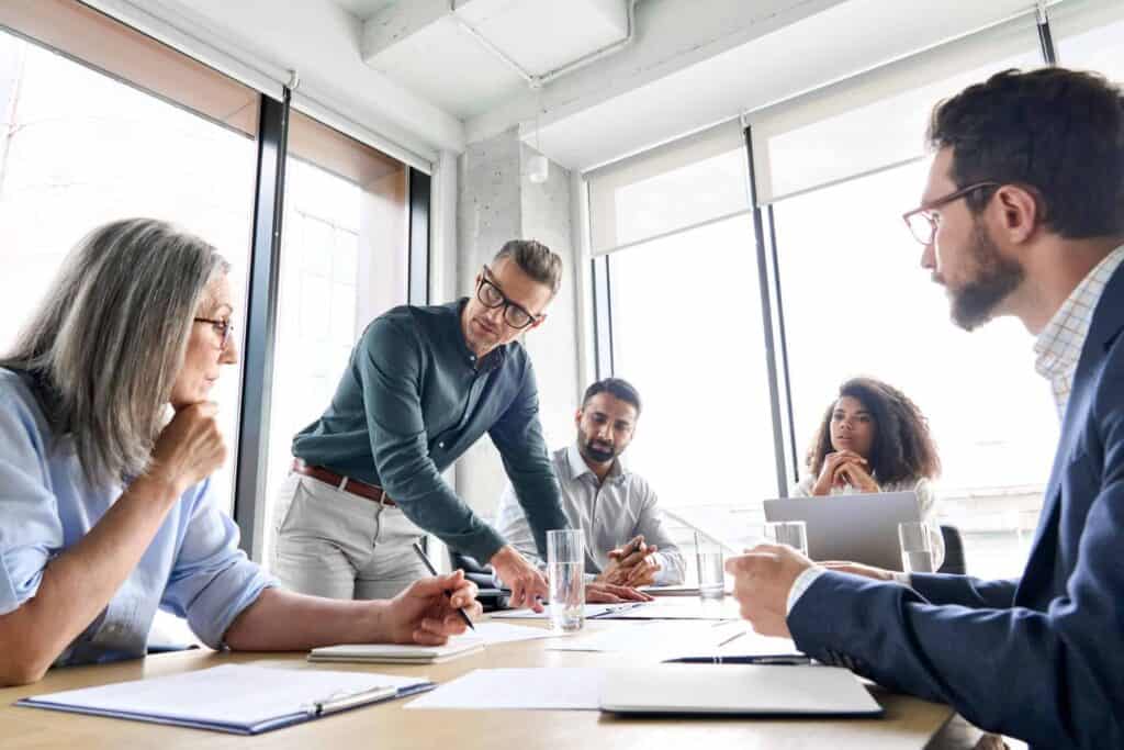 Professional business meeting at Jensten Insurance Brokers, providing expert insurance solutions and risk management advice.