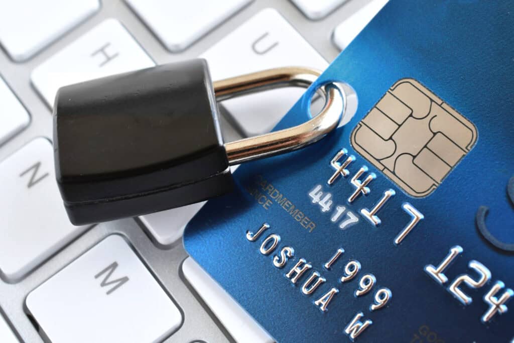 Close-up of credit card on computer keyboard symbolising cyber insurance and online financial risk for SMEs