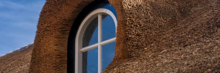 Header banner for thatched insurance guide on 7 things to consider when insuring your thatched property